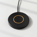 Slim black wireless charging pad with gold ring