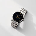 Stainless steel automatic watch with black dial